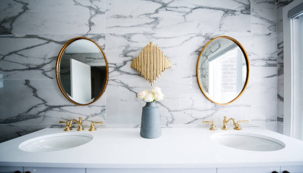 bathroom remodel with gold fixtures