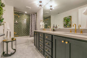green and gold bathroom remodel