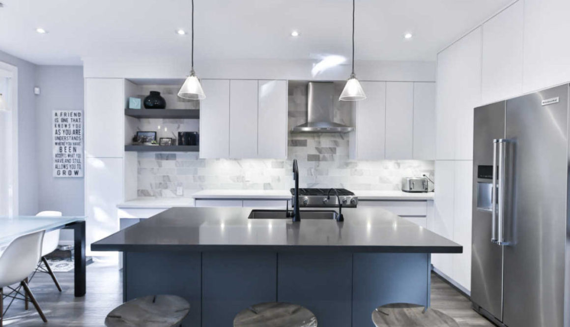 kitchen remodel with black and blue island