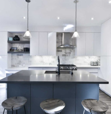 kitchen remodel with black and blue island