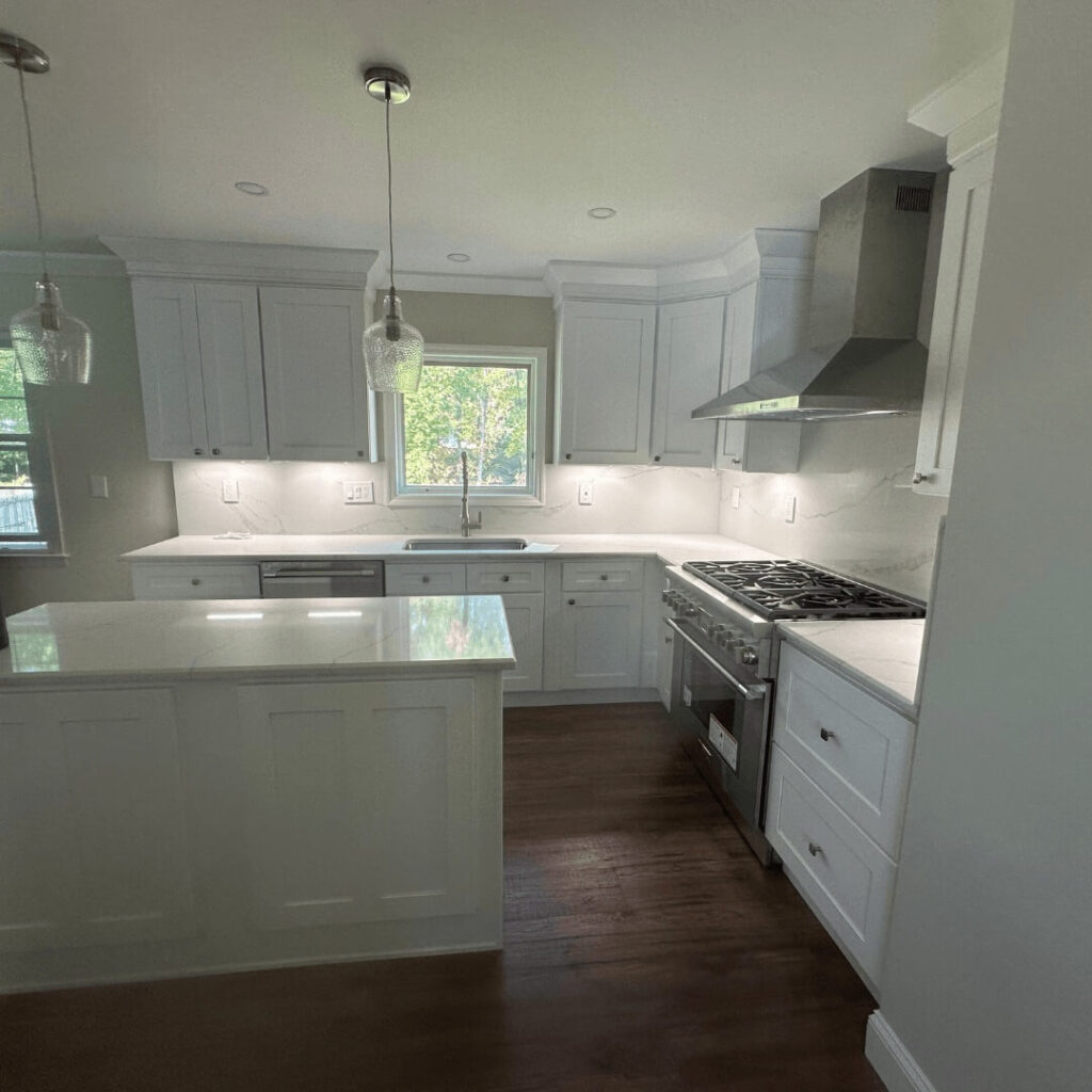 Remodeled Fairfield, NJ kitchen with white shaker cabinets and island